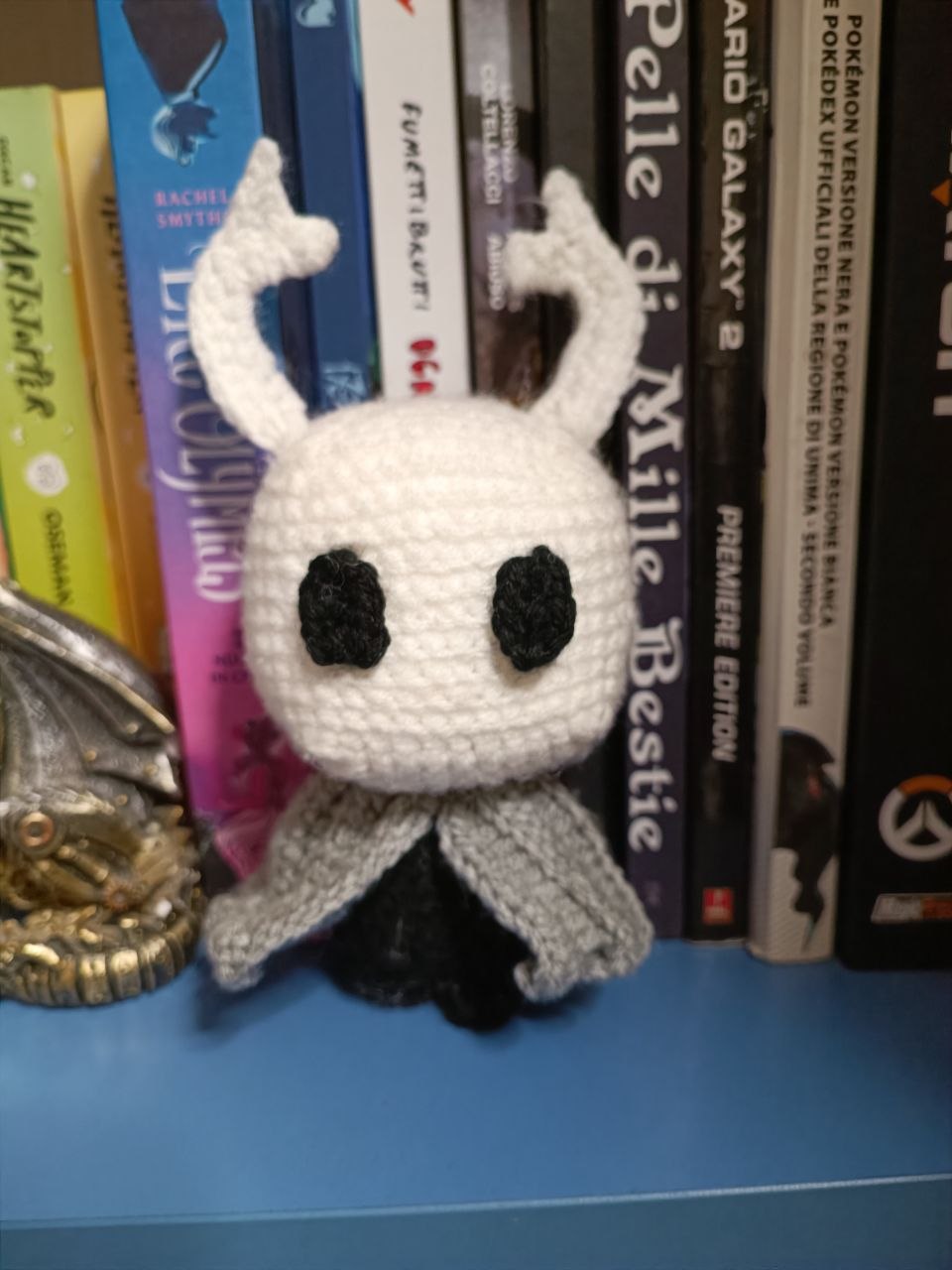 A crochet plush of the Knight from Hollow Knight I made